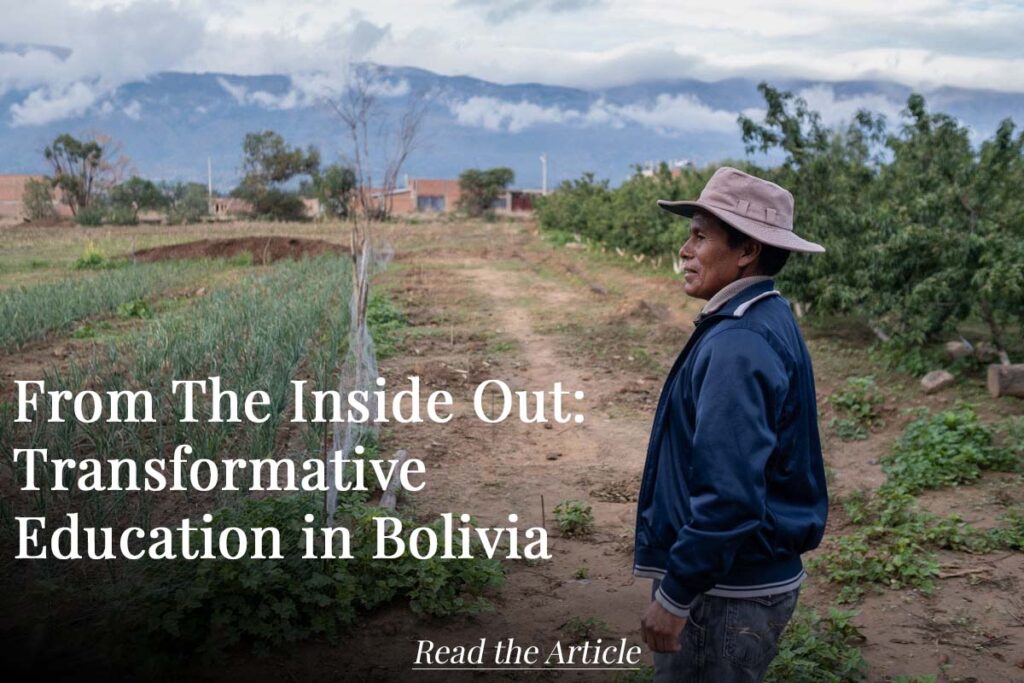 A farmer purveys his land in Bolivia